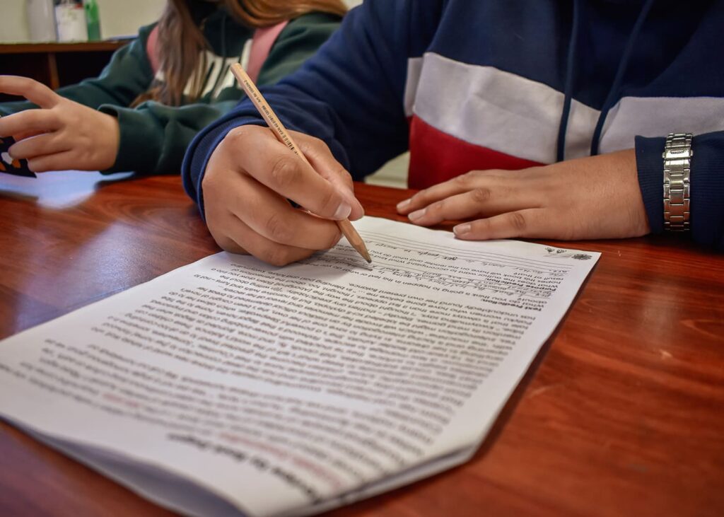 Education News - A student filling up a paper